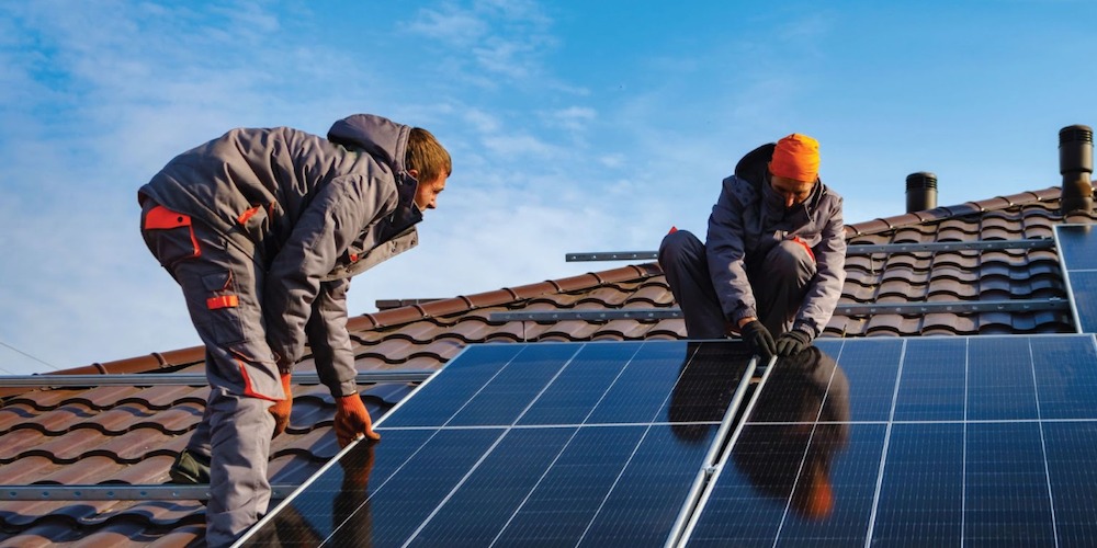 Professional solar panel installation on residential roof